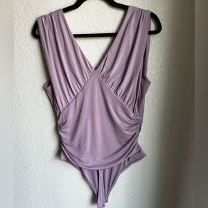 Express, lavender sleeveless bodysuit with wide straps and ruching